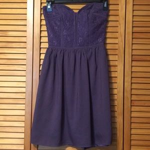 Purple strapless dress with corset upper half
